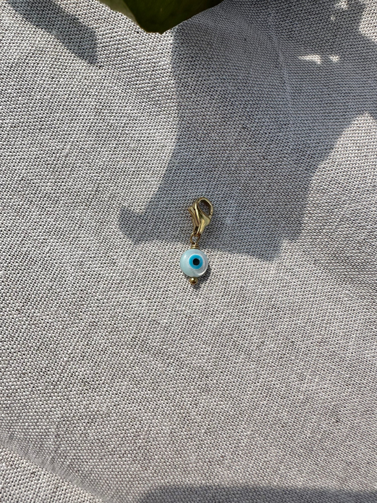 Charm oeil nacre
